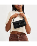 Buy Coach Tabby Light Polished Pebble Leather Mini Wristlet Crossbody Bag in Pakistan