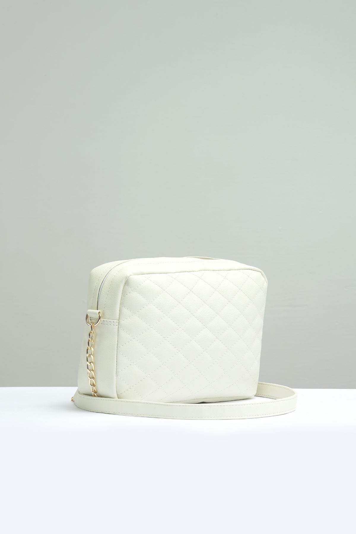 Buy Negative Apparel Quilted Embossed Crossbody Bag With Chain FD - White in Pakistan